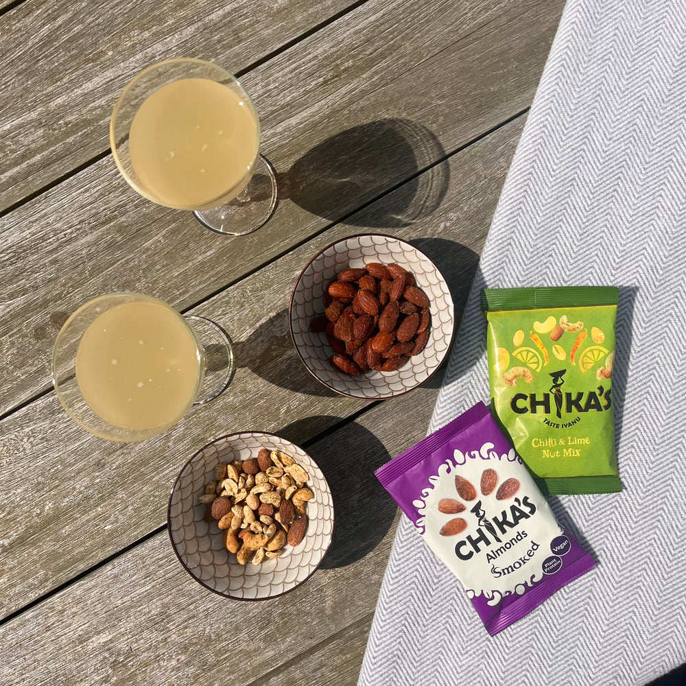 
                  
                    Load image into Gallery viewer, CHIKA&amp;#39;S Chilli &amp;amp; Lime Nut Mix - A vibrant blend of spicy and tangy flavors with a mix of premium nuts.
                  
                